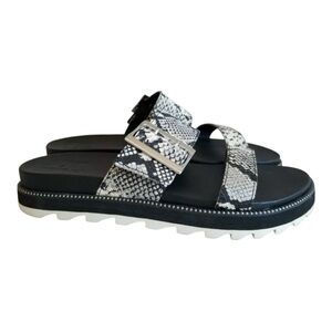 Sorel Roaming Black and White Slide Sandals with Snakeskin Print.